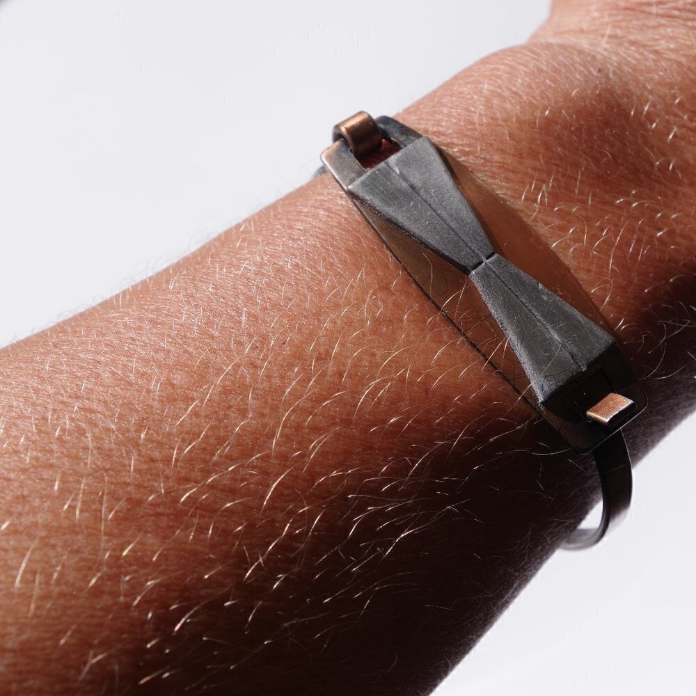 Women`s copper/grey tone bracelet. 2 3/8 inches in